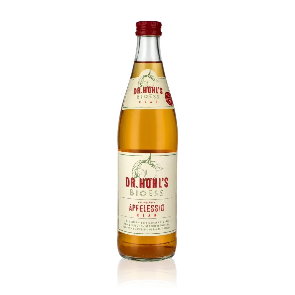 Dr. Höhl's Bioess klarer Apfelessig Flasche auf schwarzem Hintergrund.
