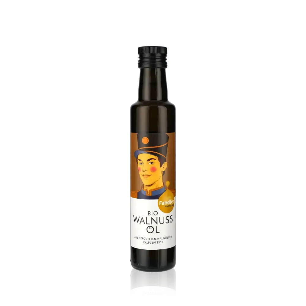Fandler Bio Walnussöl Flasche auf schwarzem Hintergrund.