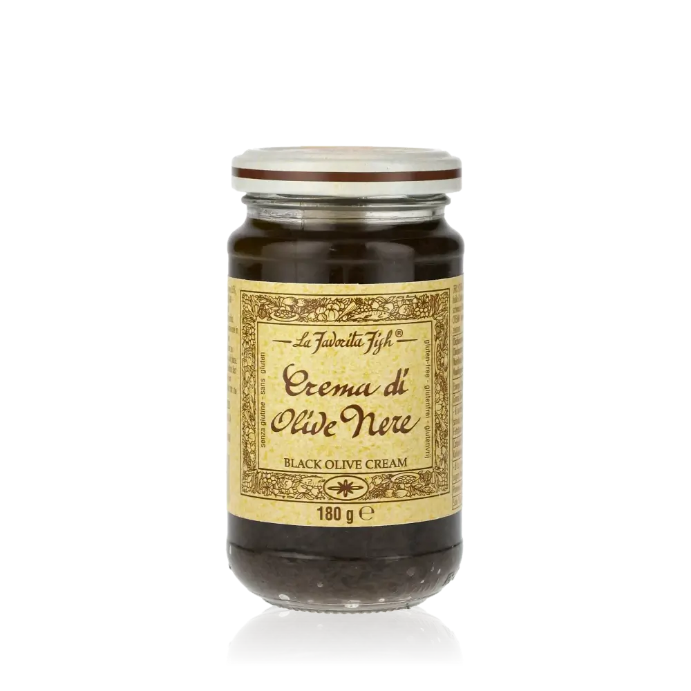 Glas mit Favorita Crema di Olive Nere Aufstrich.
