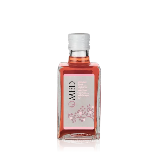 O-MED Rosé Essig Flasche mit Etikett und Verschluss.