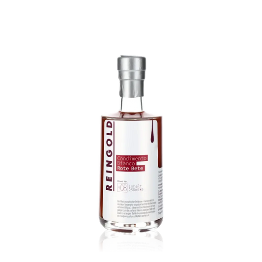 Reingold Condimento Bianco Rote Bete Essigflasche vor schwarzem Hintergrund.