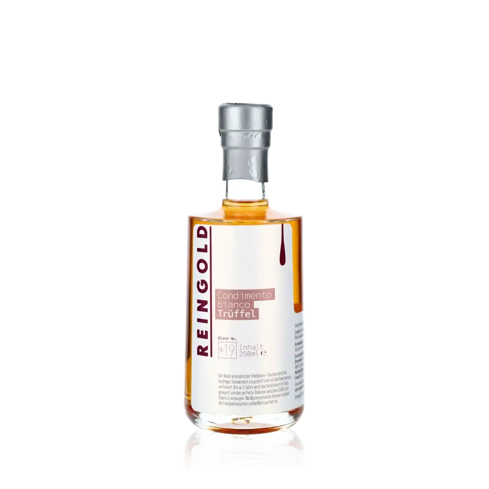Reingold Condimento Bianco Trüffel Essigflasche auf schwarzem Hintergrund.