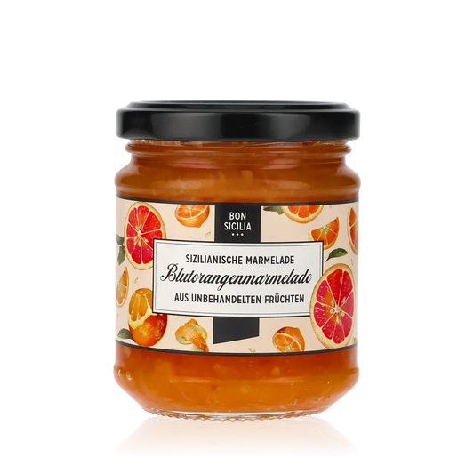Bon Sicilia Blutorangenmarmelade Glas mit Etikett und Orangen.