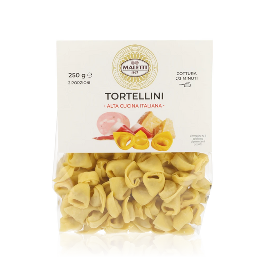 Tortellini-Verpackung mit Schinkenabbildung.