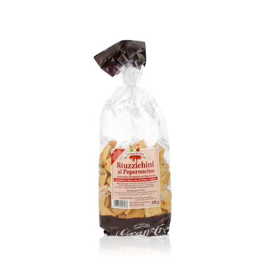 Feinkostgebäck Stuzzichini al Peperoncino in transparenter Verpackung.